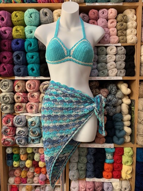 Crochet bikini and sarong on model