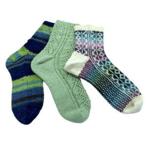Trio of knitted socks - Cabled, Lace, Fair Isle